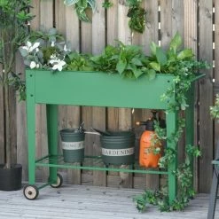 Outsunny Jardinière Sur Pieds Potager Dim. 104L X 39l X 80H Cm étagère 2 Roues + Insert D'irrigation Métal Vert -Outsunny Soldes Magasin 28443744 2